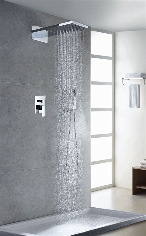 Enjoy the feeling of water raining down over you by installing a rain shower head in the ceiling. Contemporary/Modern Volume Complete Shower System with Rough-in Valve | Modern shower, Shower ...