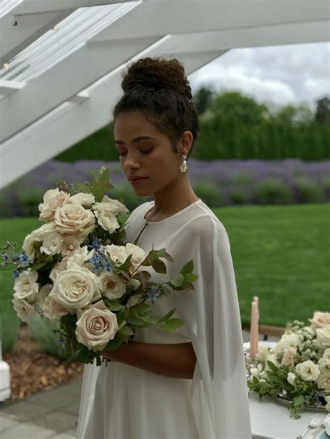 A chignon hairstyle with straightened curls looks natural, casual and catchy. Modern wedding hair + makeup | Jen Lagers in 2020 | Curly bun hairstyles, Hair and makeup artist ...