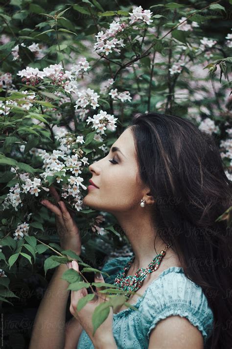 Woman Smelling Flowers By Stocksy Contributor Jovana Rikalo Stocksy