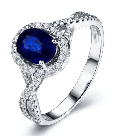 2 Carat Oval Cut Blue Sapphire And Diamond Halo Engagement Ring In