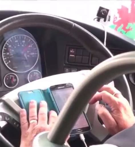 Coach Driver Filmed Doing Paperwork On Mobile Phone While Driving