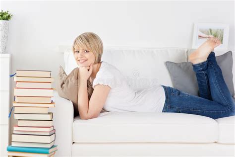 Young Woman Relaxing On A Sofa Stock Photo Image Of Adult Hobby