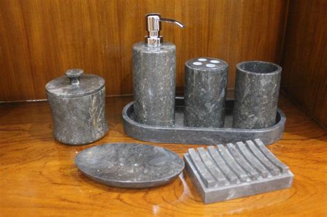 Bathroom sets that incorporate stone soap/lotion dispenser, brush holder, tumbler, cotton jar, tissue box. Bathroom Accessories - Stone Bath Sets