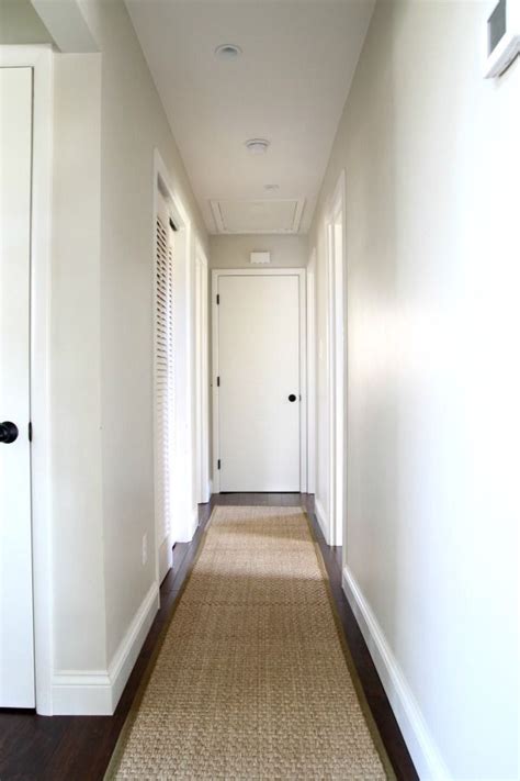 A Long Narrow Hallway Help For A Dark Scary Mess Narrow Hallway Decorating Long Hallway