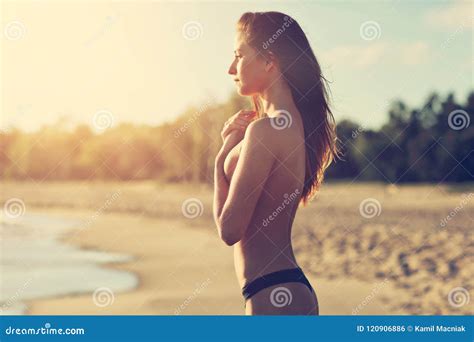 Beautiful Woman At Dusk On The Beach Stock Photo Image Of Lifestyle Standing