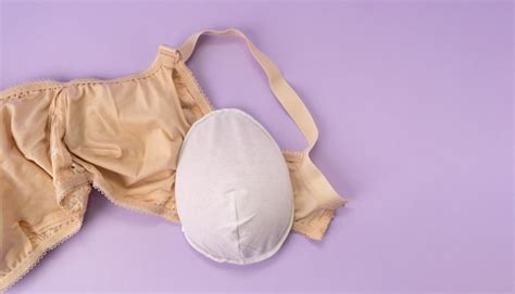 Premium Photo Breast Prosthesis Before Inserting It Into The Special Bra Breast Cancer Awareness