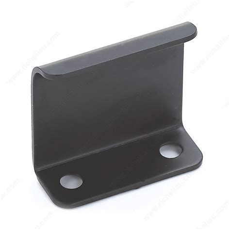Some edge pulls, like these brushed ones from rejuvenation, hang slightly visible over the edge of the cabinet, while others are even more minimalist. Contemporary Metal Edge Pull - 3966 - Richelieu Hardware