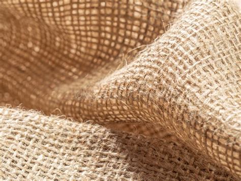 Crumpled Sackcloth Close Up View Texture Of Brown Burlap Fabric