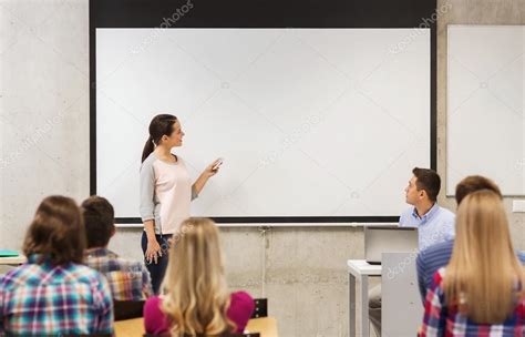 Smiling Student In A Classroom Hoodoo Wallpaper