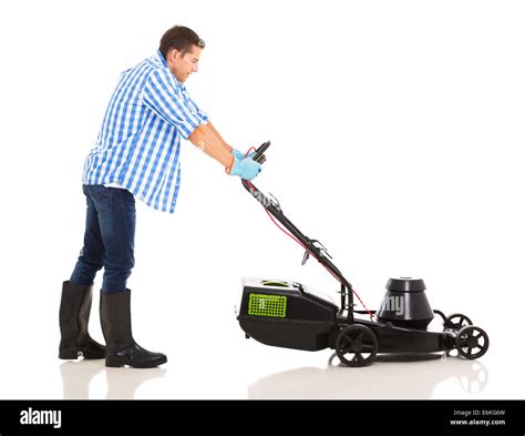 Side View Of Man Pushing Lawnmower Stock Photo Alamy