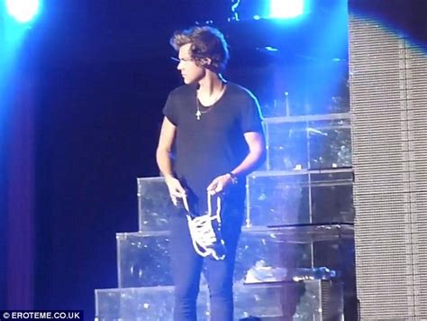 One Directions Zayn Malik Nibbles At Harry Styles Candy Thong On Stage Daily Mail Online