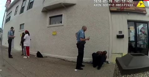 New Body Camera Footage Shows George Floyd Handcuffed On The Street
