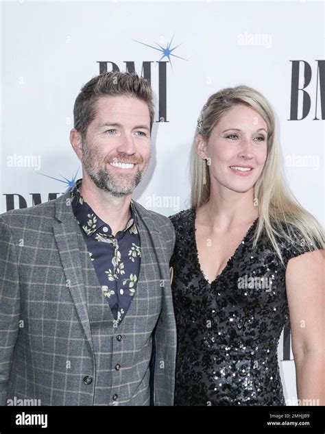 josh turner left and his wife jennifer ford arrive at 67th annual bmi country awards