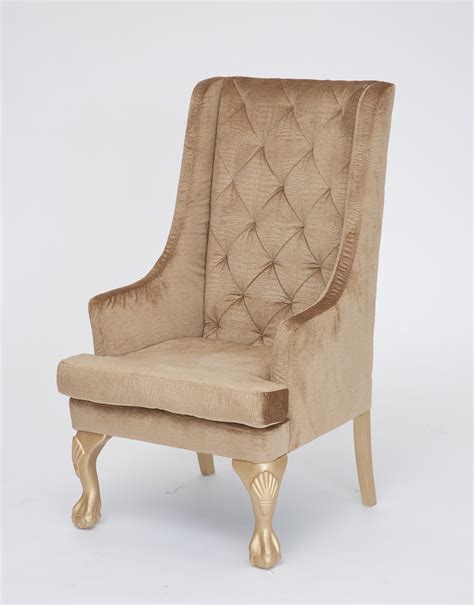 Very often, the back is closely tailored, while part of a wider seat to the bottom, is in the form of skirt. Gold High Back Wing Chair - Nüage Designs
