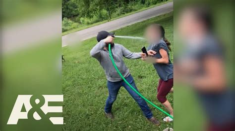 Homeowner Fights Neighbors Off His Yard With A Garden Hose