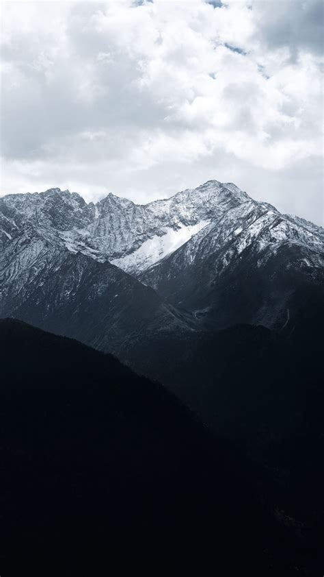 Download Wallpaper 1350x2400 Mountains Mountain Range Peaks Clouds