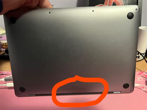 Can anyone please try and decipher the serial number on my MacBook? It