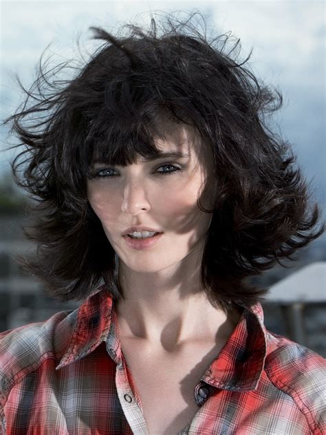 Additionally, if you go to a men's barbershop, they will probably always give you male sideburns, which will ruin the cuteness of the cut and is a key deferentiator between a short feminine cut and a short masculine cut, more on that below. Layered feminine haircut that still looks good in the wind