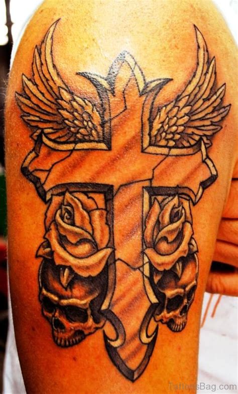 Cross tattoo on ankle is usually black or not colored just the border is drawn as the tattoo is small and there is no space for colors. 53 Awesome Cross Tattoos On Shoulder