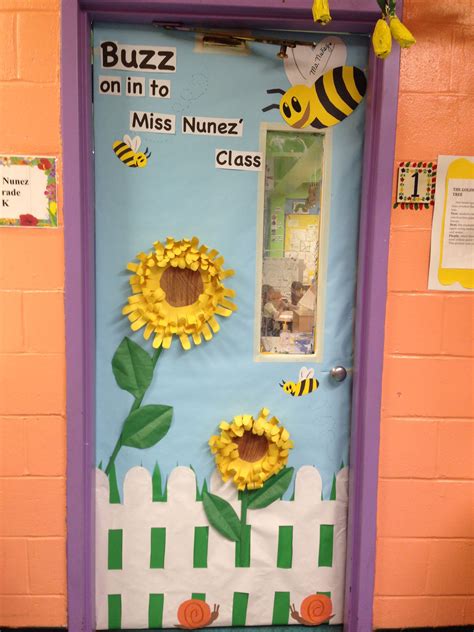 You can decorate the kindergarten classroom with a theme or concept of a happening moment or something children like. Kindergarten spring classroom door. | Bee themed classroom ...