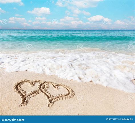 hearts drawn on the beach sand stock image image of water drawn 49757771