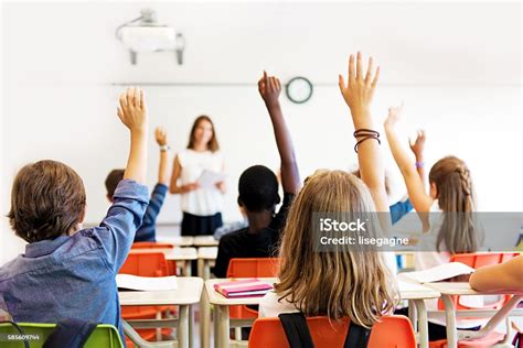 School Kids In Classroom Stock Photo And More Pictures Of Adult Istock