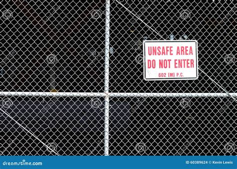 Unsafe Area Behind A Fence With Do Not Enter Stock Photo Image Of