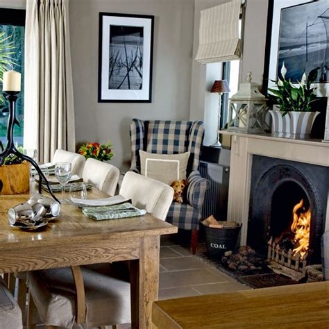 Dining room ideas with fireplace. Dining room with roaring fire | Step inside a cosy ...