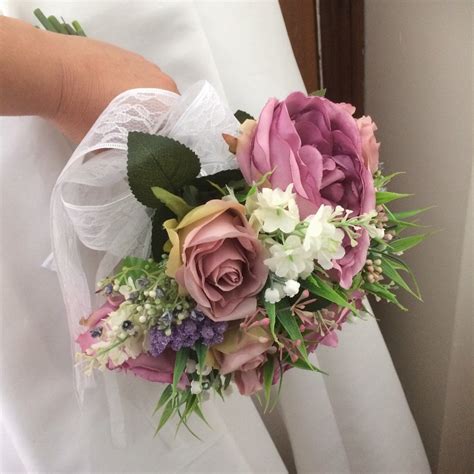 A Bouquet Collection Of Ivory Dusky Pink And Mauve Artificial Silk Flo