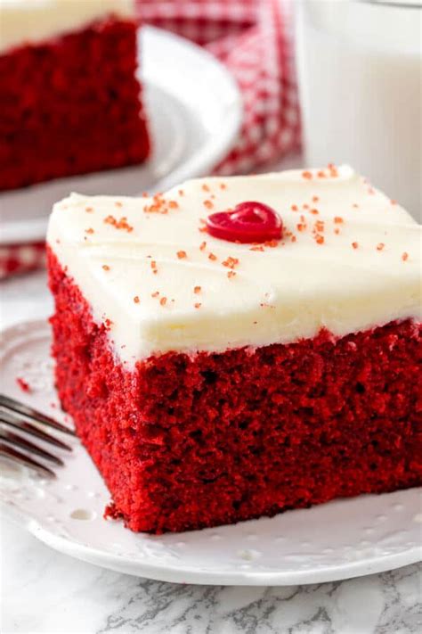 The most incredible red velvet cake is fluffy, soft and buttery with the most perfect velvet texture! Easy Red Velvet Cake - Just so Tasty