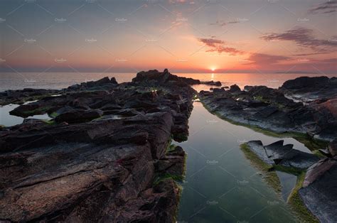 Beautiful Sunrise Over The Sea Stock Photo Containing Beach And Sunrise