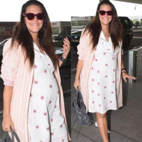 mommy to be neha dhupia has found the right way to beat the heat view hq pics bollywood news