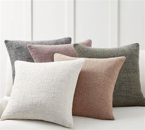 The leaves are perfectly stitched on a heavy beige cotton. Faye Textured Linen Cushion Cover | Pottery Barn AU