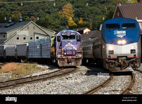 Amtrak Vermonter Passenger Train passes NECR locomotives switching