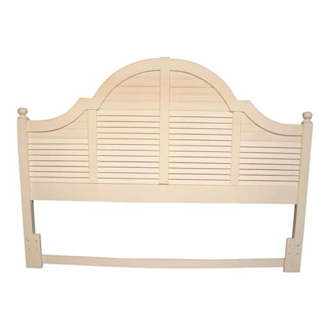 The replicated light cream paint with subtle replicated brushing flows over the graphic leaf design patterns and bead board panel accents creating a relaxing atmosphere that is sure to make any child feel at home. Seaside Retreat Coastal Cottage King Headboard | Chairish