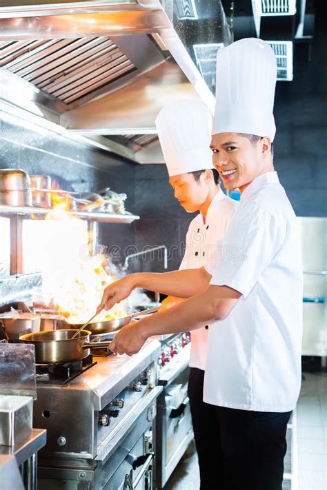 asian chef smiling at camera in restaurant kitchen stock image image of camera happy 22656607
