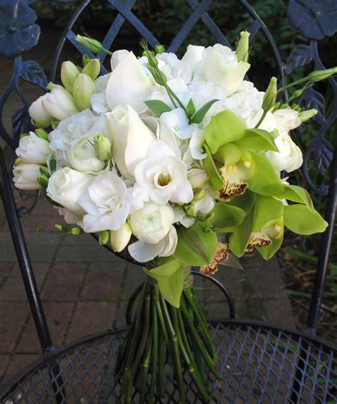 What kind of orchids can i buy for sale? Bridal bouquet of green cymbidium orchids, white roses and ...