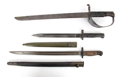 1858 Pattern British Navel Cutlass Bayonet And Two Lee Enfield Bayonets