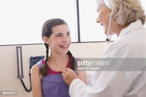 Doctor Examining Teenage Girl With Stethoscope Photo Getty Images
