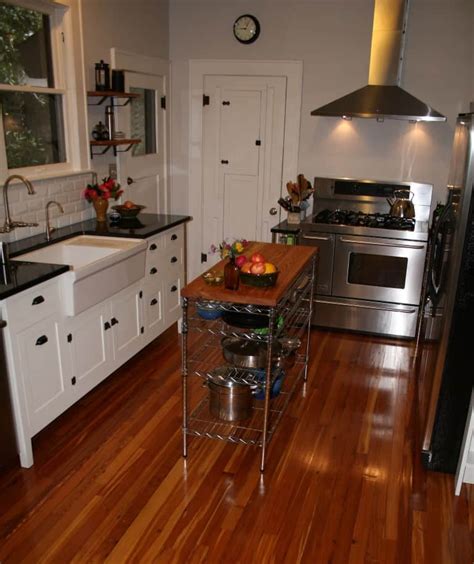 It's an upgrade version of regular ceramic tile because of a manufacturing process that makes it harder and less porous — a good choice for kitchens where spills are likely. Heart Pine Kitchen Flooring - Wood Floors