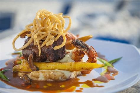 This mexican shrimp cocktail recipe is a quintessential summer appetizer, especially when served with grilled shrimp. Grilled 6oz. filet mignon, 3 jumbo blackened shrimp, roasted garlic-wasabi mashed potatoes ...