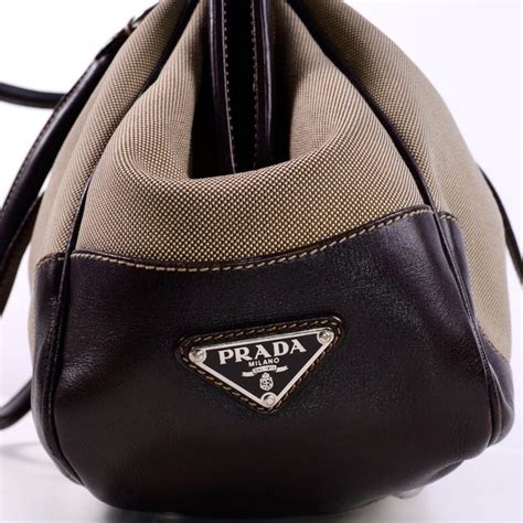 Founded in 1913 by mario prada, prada — originally named fratelli prada — began in milan with a collection of trunks, beauty cases and leather bags. Prada Brown Jacquard Canvas and Leather Doctor Style ...