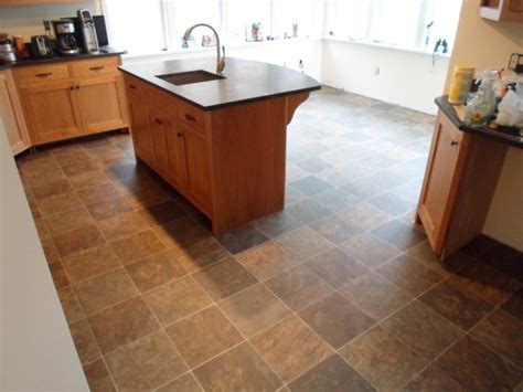 Vinyl sheet flooring is generally considered to be a highly durable material. Kitchen Sheet Vinyl tile look Tarkett - Traditional ...