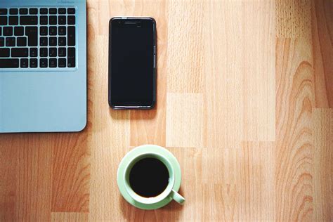 The sleek, simple lines and warm walnut finish make it easy to pair with different style aesthetics, while the deep. coffee, computer, cup, desk, keyboard, laptop, mobile ...