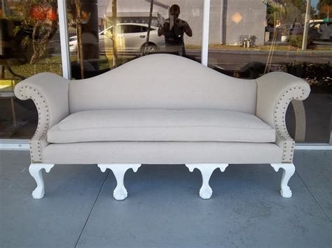 Raspberry, green, lavender w/beige background. Camel Back Sofa at 1stdibs