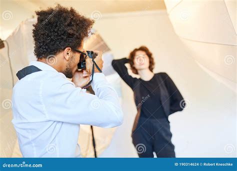 Creative Photographer Takes Portrait Photos Stock Photo Image Of