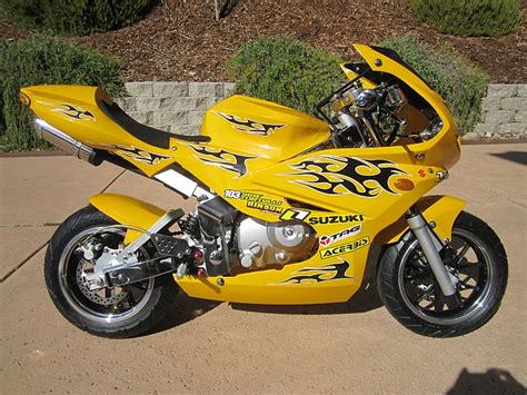 Sharp lines and edgy styling, with the attitude of a bike rocking twice as many horses. CAFE RACER CUSTOM SUPER POCKET BIKE 125CC RACE WIDE TIRES ...