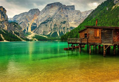 Mountain Lake Lake Sudtirol Italy Boat Pier Rocks