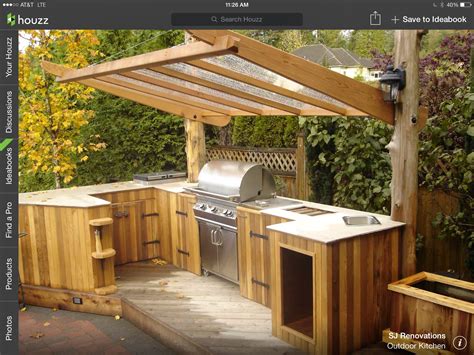 An umbrella to protect your investment (or the. Simple outdoor kitchen hmmmm wood in South Florida ...