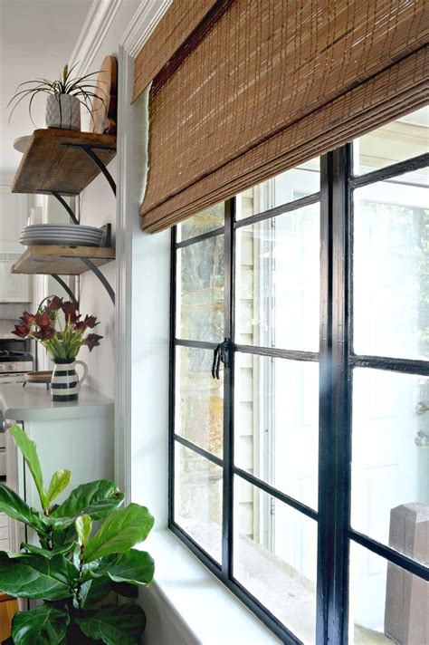 Black trim and black doors how to paint your trim and interior doors black plus the best black paint colors to use black baseboards black crownmolding the black window trim & windows makes the space look more custom & helps anchor the room. Painted Black Window Frames | Black window frames, White ...